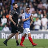 Tom Lowery, with first-team physio Jack Hughes, is one of the players who's suffered injury woes for Pompey this season.