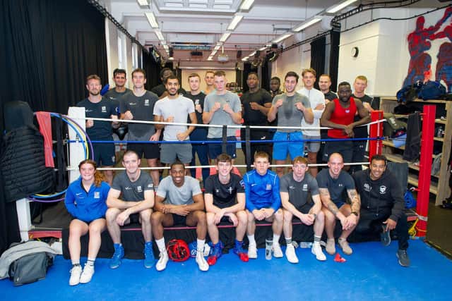 Quinton Shillingford at his boxing gym, Heart of Portsmouth, with his team and Royal Navy boxers on Tuesday 5th October 2021.  picture: Habibur Rahman