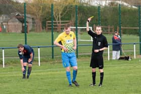 A Lyndhurst player is booked during this season's Hampshire Premier League match at Paulsgrove. The 2019/20 season was the first in which referees in the Wessex League and HPL can send a player to a 10-minute sin-bin for dissent. Picture: Duncan Shepherd