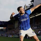 Colby Bishop celebrates his penalty for Pompey today against Port Vale. Pic: Jason Brown