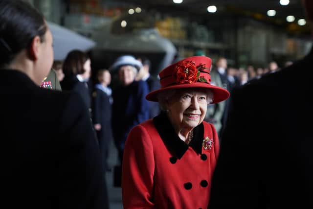Queen Elizabeth II during a visit to HMS Queen Elizabeth at HM Naval Base, Portsmouth, ahead of the ship's maiden deployment. The visit comes as HMS Queen Elizabeth prepares to lead the UK Carrier Strike Group on a 28-week operational deployment travelling over 26,000 nautical miles from the Mediterranean to the Philippine Sea. Picture: Steve Parsons/PA Wire