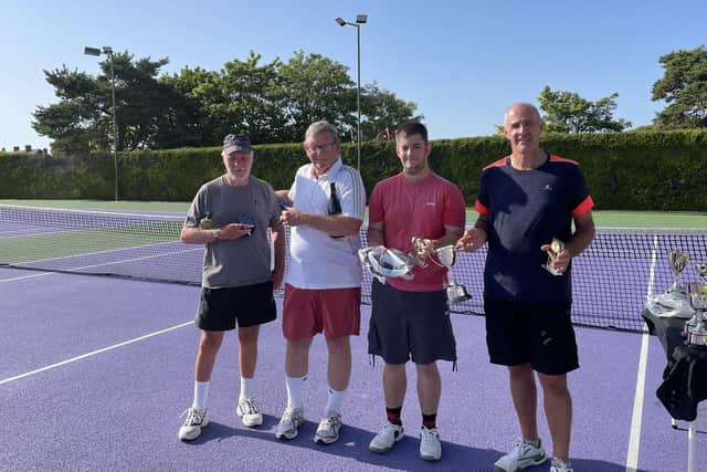 Men's Members Cup doubles beaten finalists Chris Little, far left, and John Wright, second left, alongside father and son duo winners Jake and Mike Betteridge, far right