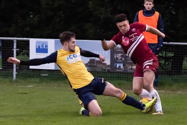 Zak Sharp, left, in action for Moneyfields in 2019/20. After agreeing to stay at Baffins last week, the defender has subsequently signed for AFC Portchester. Picture: Duncan Shepherd