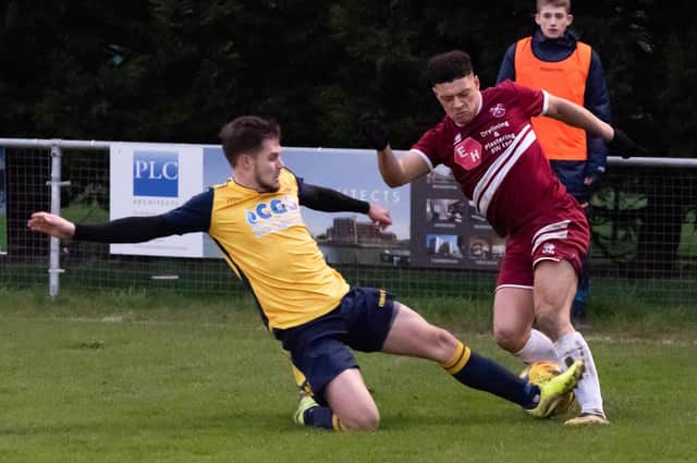 Zak Sharp, left, in action for Moneyfields in 2019/20. After agreeing to stay at Baffins last week, the defender has subsequently signed for AFC Portchester. Picture: Duncan Shepherd