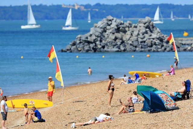 Groups gathered on the shoreline in Southsea to enjoy some sunbathing and swimming in the Solent.