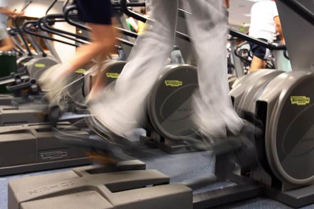 People exercising in a gym.