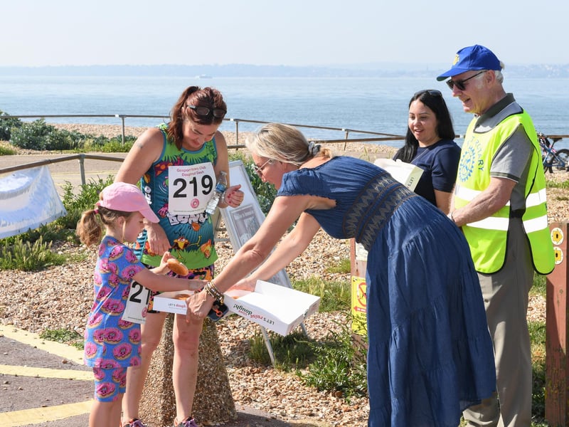 Gosport MP Dame Caroline Dinenage hands out doughnuts.
Credit: Paul Jacobs/pictureexclusive.com