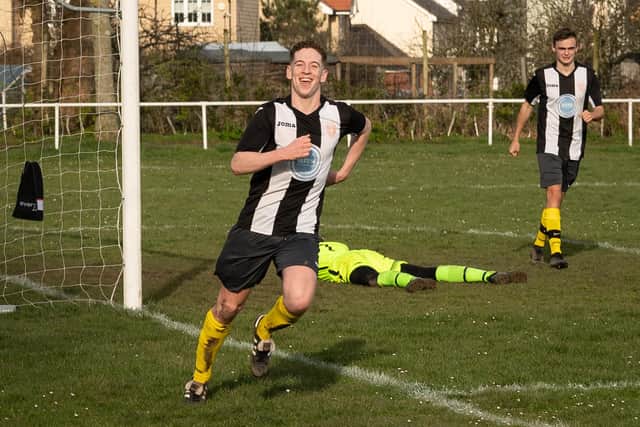 Hayling United's Jack Bishop celebrates his goal in yesterday's Hampshire Premier League game at Locks Heath. Picture: Keith Woodland