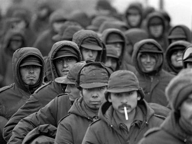 Argentinian prisoners of war at Port Stanley, capital of the Falkland Islands, waiting to be repatriated via Montevideo
