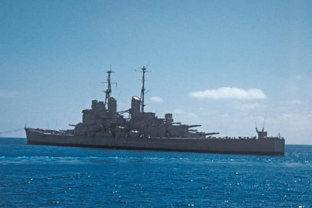 HMS Vanguard under tow in the Solent which looks more like the Mediterranean. This was shortly after  her Portsmouth Harbour escapade. Picture: Tim King.