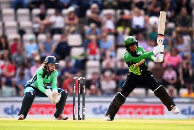 Sophia Dunkley of Southern Brave Women plays a shot as Sarah Bryce of Oval Invincibles Women looks on. Photo by Harry Trump/Getty Images.