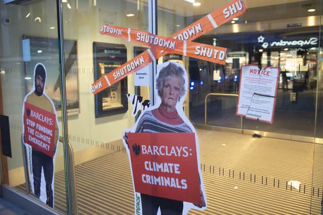 Greenpeace activists shut down Barclays branches in Newcastle on March 2. Picture: Tim Morozzo/Greenpeace