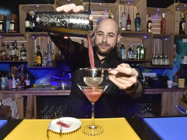 Sip and Solve opened its doors in Portsmouth in August 2024. It is an immersive puzzle bar with a range of games and puzzles to enjoy whilst having a drink.
Pictured is: Bar manager Jack Vant making a cocktail called Dracula's Bite.
Picture: Sarah Standing (151124-5729)