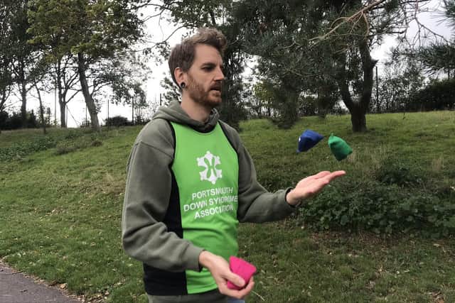 Ben Brooks is taking on a mile each day for 21 days using various methods of unusual transport to raise funds for Portsmouth Down Syndrome Association's T21 Challenge. Pictured: A mile of juggling