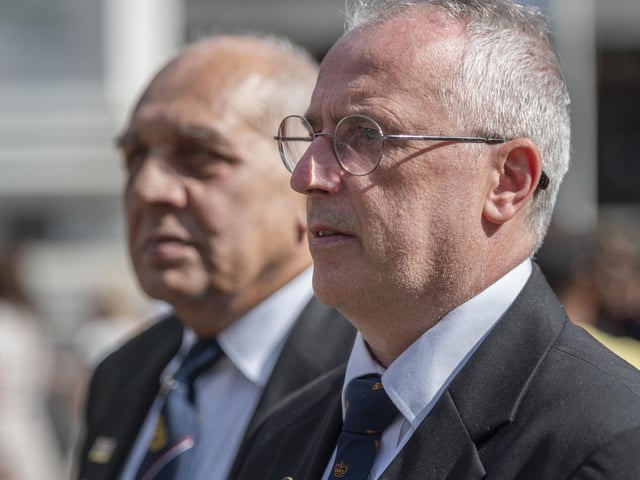 Veterans pay their respects and bring in the proclamation of the new King.
