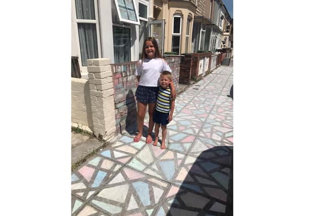 Chloe and Callum Topham, 10 and 5, have brightened up Portchester Road in North End with their colourful chalk design
