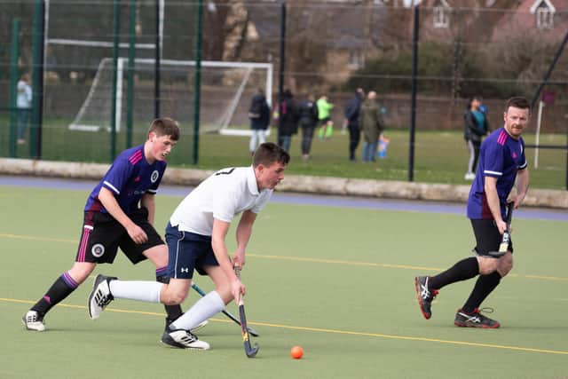 Portsmouth pair Ben Hayward (left) and Jon Farmer watch a Gosport opponent on the ball. Picture: Duncan Shepherd