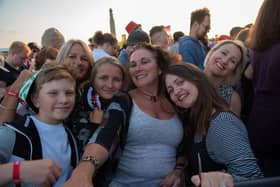 Victorious 2021 - Susan Aistrope (centre) with friends and family wait for The Kooks at the Common Stage. Picture: Vernon Nash (270821-109)