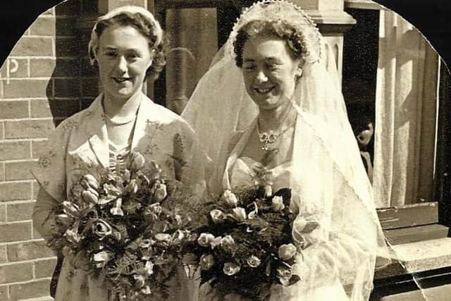 Barbara on her wedding day in May 1954 with Beryl as her bridesmaid.