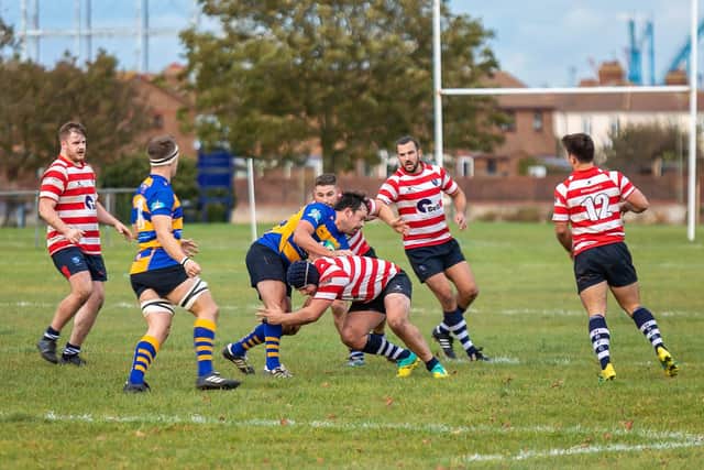 Gosport & Fareham's Alex Duncombe is tackled. Picture: Mike Cooter