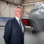 Charles Woodburn, chief executive of BAE Systems, pictured with the full-sized mock-up of the 6th Generation combat aircraft, the Tempest at Warton. The picture comes as BAE revealed its first half-year results for 2022.
