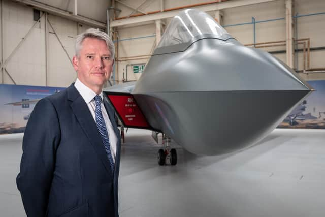 Charles Woodburn, chief executive of BAE Systems, pictured with the full-sized mock-up of the 6th Generation combat aircraft, the Tempest at Warton. The picture comes as BAE revealed its first half-year results for 2022.