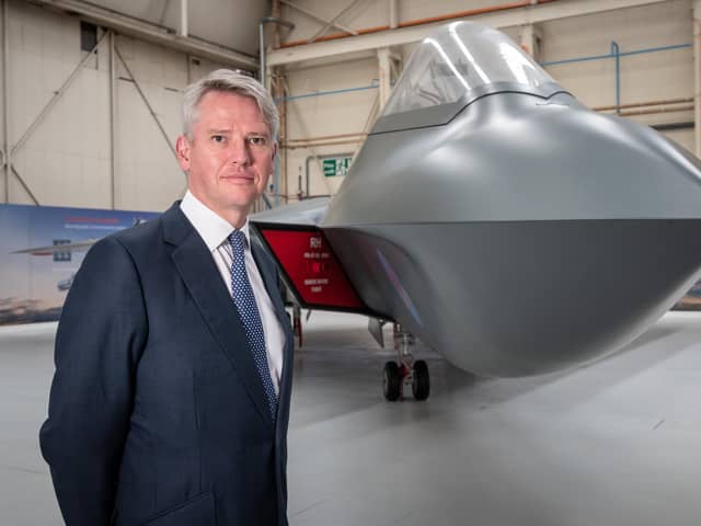 Charles Woodburn, chief executive of BAE Systems, pictured with the full-sized mock-up of the 6th Generation combat aircraft, the Tempest at Warton. The picture comes as BAE revealed its first half-year results for 2022.