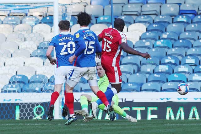 Craig MacGillivray produced an excellent stoppage-time save to deny John Akinde - and prevent yet more Fratton Park agony. Picture: Joe Pepler