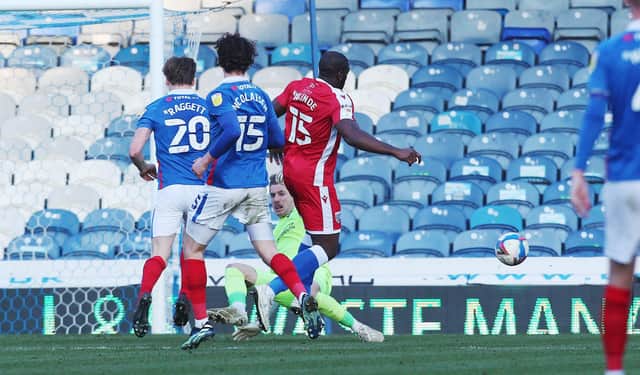 Craig MacGillivray produced an excellent stoppage-time save to deny John Akinde - and prevent yet more Fratton Park agony. Picture: Joe Pepler
