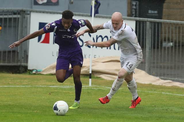 Dartford sub Ky Marsh-Brown takes on Hawks' Nicky Bailey. Pic: Dave Haines.