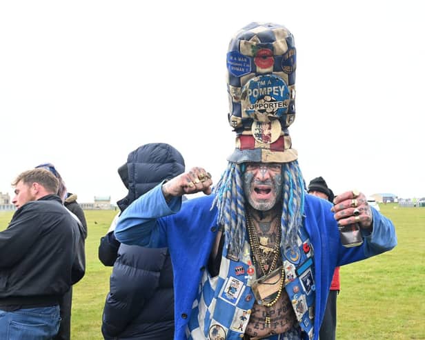 Thousands of Pompey FC fans flocked to Southsea Common to celebrate the team's League One title and promotion. Pictured: John Pompey WestwoodPicture Credit: Keith Woodland