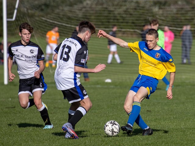 Fleur De Lys Victory U16s (white) v Petersfield. Picture by Alex Shute