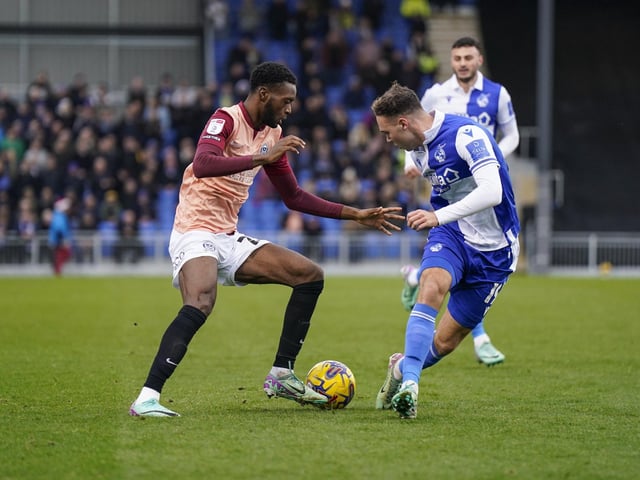 Abu Kamara is challenged by Bristol Rovers midfielder Harvey Vale in the Boxing Day clash. Picture: Jason Brown/ProSportsImages