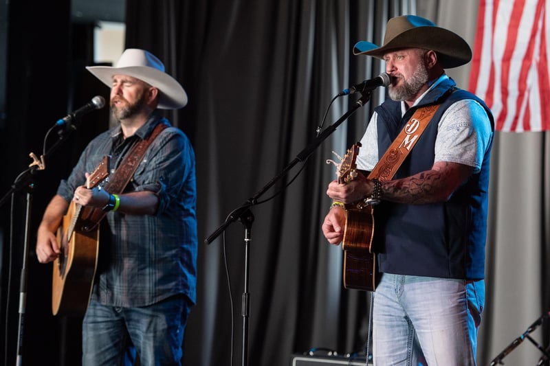 Dusty Moats and Jesse Jennings perform at Country on the Coast 2024.