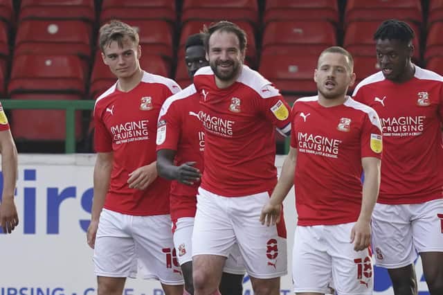 Former captain Brett Pitman scored twice for Swindon in their 3-1 defeat of Pompey. Picture: Jason Brown