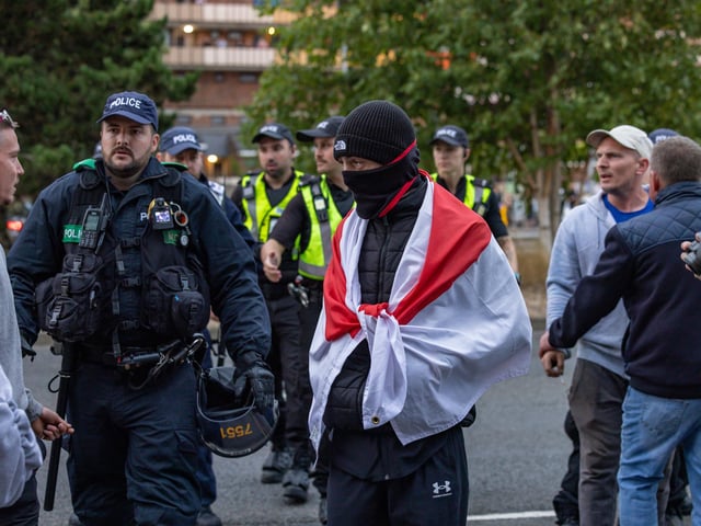 Policing the Anti-immigration protest near the UK Border Agency Building in Portsmouth. Picture: Mike Cooter (070824)