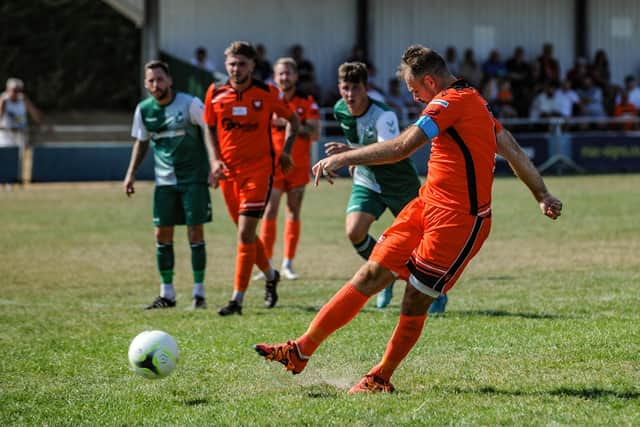 Brett Pitman fires a penalty leveller for AFC  Portchester at Blackfield & Langley. Picture by Daniel Haswell.