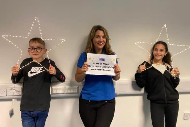 Clare Ansell CEO (middle) and two young people from the Fratton Mini Ambassadors Programme