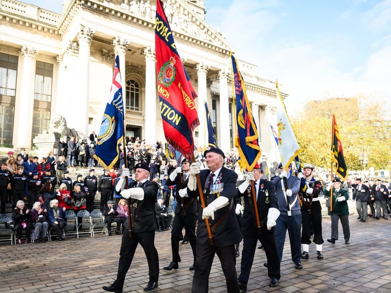 Pictured is: Standard Bearers led the veterans off the parade
Picture: Keith Woodland (121121-216)