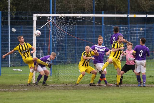 Co-op Dragons (yellow) v AFC Hilsea. Picture by Kevin Shipp
