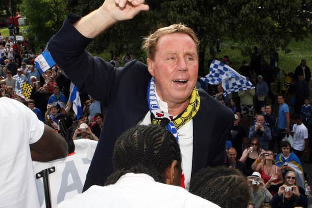 Harry Redknapp celebrates Pompey's FA Cup win in 2008 during the open-top bus parade around the city. Picture: Joe Pepler/ Portsmouth FC