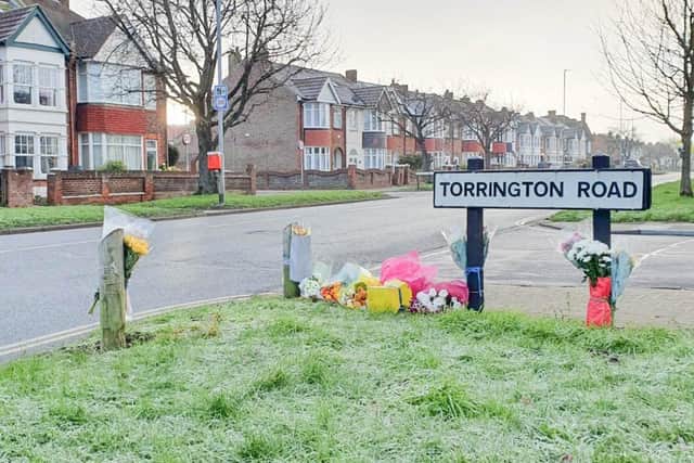 Flower tributes at the scene of the fatal crash in New Road at the junction with Torrington Road, Portsmouth on 7 January 2020. Picture: Habibur Rahman