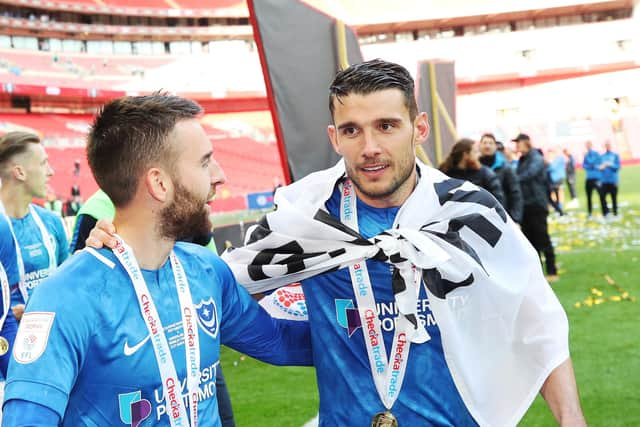 Former Pompey favourite Gareth Evans, right Picture: Joe Pepler