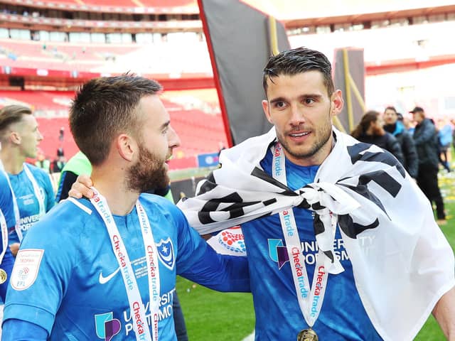 Former Pompey favourite Gareth Evans, right Picture: Joe Pepler