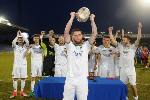 Hawks lift the Portsmouth Senior Cup after beating Petersfield Town 5-0 at Fratton Park in May 2017. Picture: Sarah Standing.