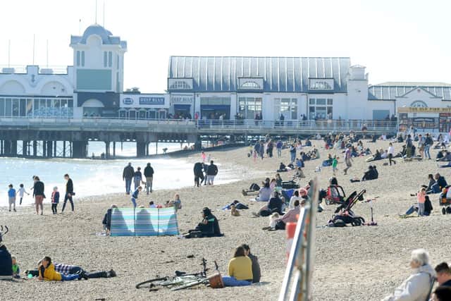 Many people gathered down in Southsea enjoying the lovely weather on Good Friday. Picture: Sarah Standing (020421-3264)