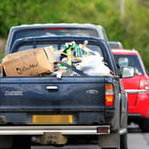 Loaded cars queuing for Bishop's Waltham Household Waste and Recycling Centre on the day it reopened in May