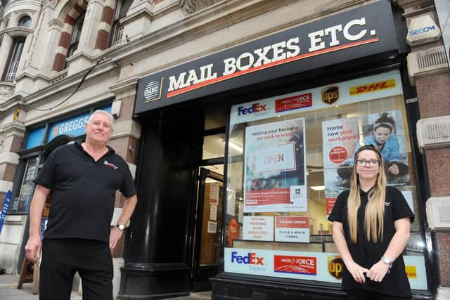 Mail Boxes Etc in Portsmouth, has been around for 17 years and provide a secure place for people to receive their mail.Pictured is: Russell Sykes, co-owner and Mollie Stanhope, assistant manager.Picture: Sarah Standing (121020-5372)