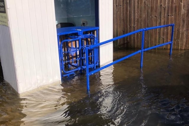 The flooded football ground.
