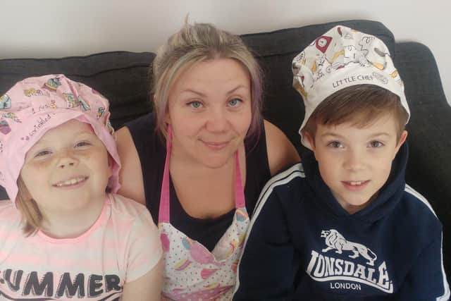 Caroline Storey, 35, with children, Kian Storey, 10, and Emily Storey, eight.